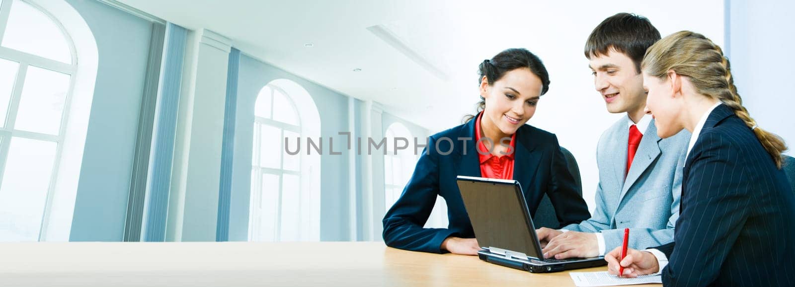 Portrait of business people interacting together on the background of office building