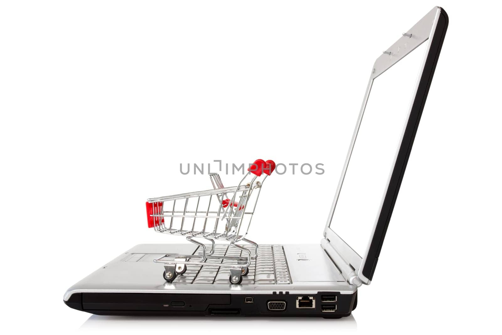 laptop with shopping cart over a white background