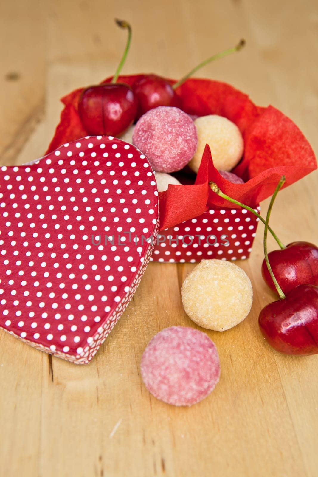 Truffles and cherries in heart box