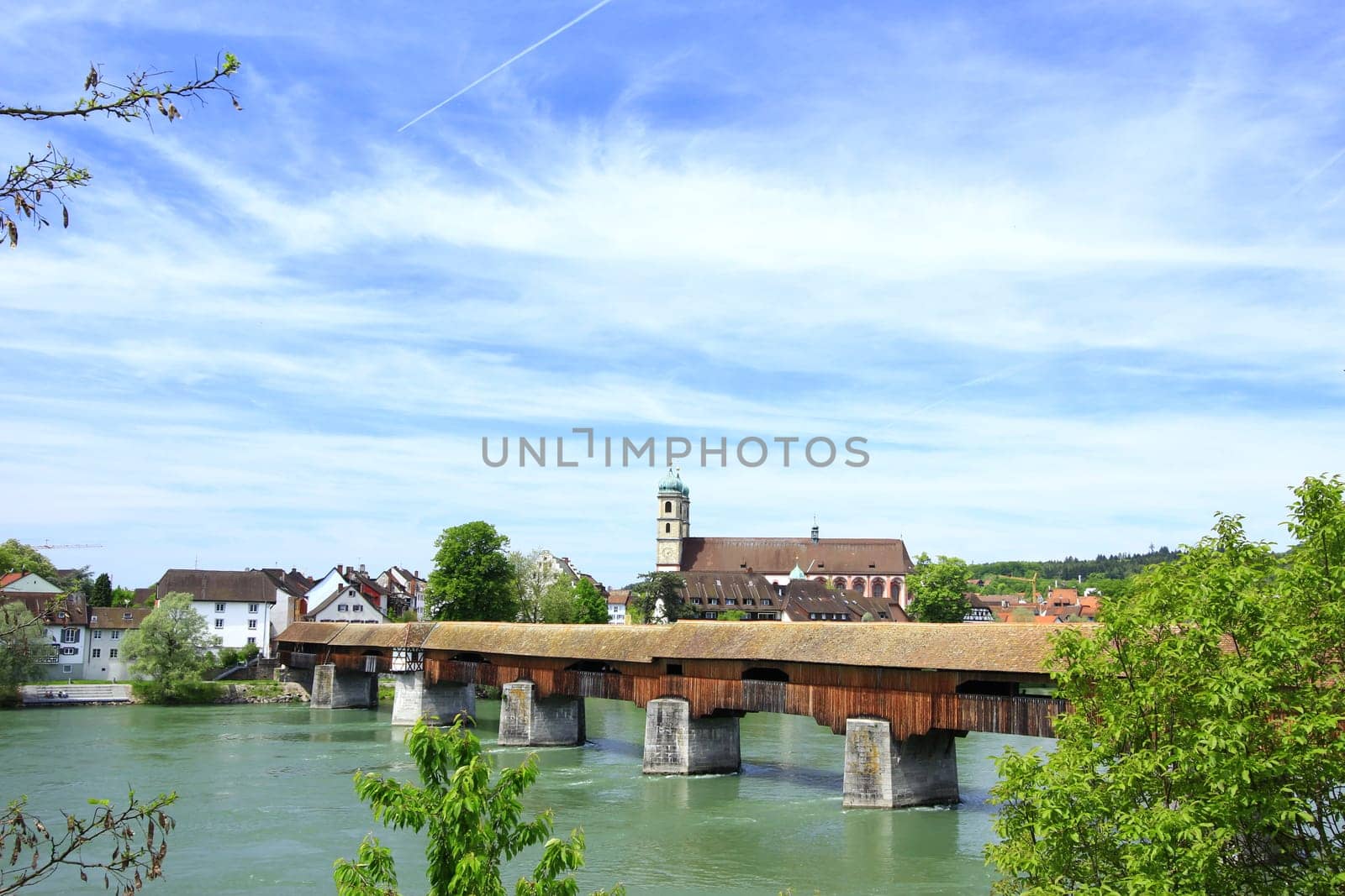 the famous covered wooden bridge over the Rhine from the German bank of Bad Säckingen to the Swiss bank