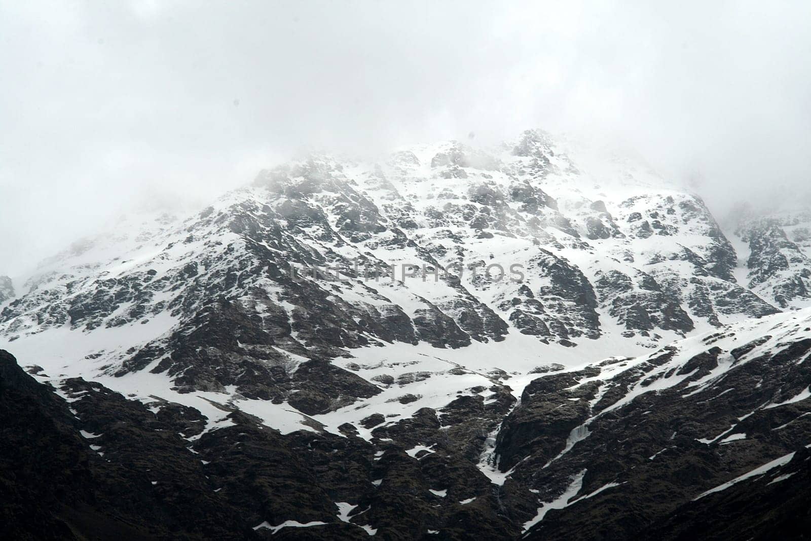 Snow covered Himalayan Mountain viewed from trekking path to Yamunothri, Uttarakahand, India, Asia