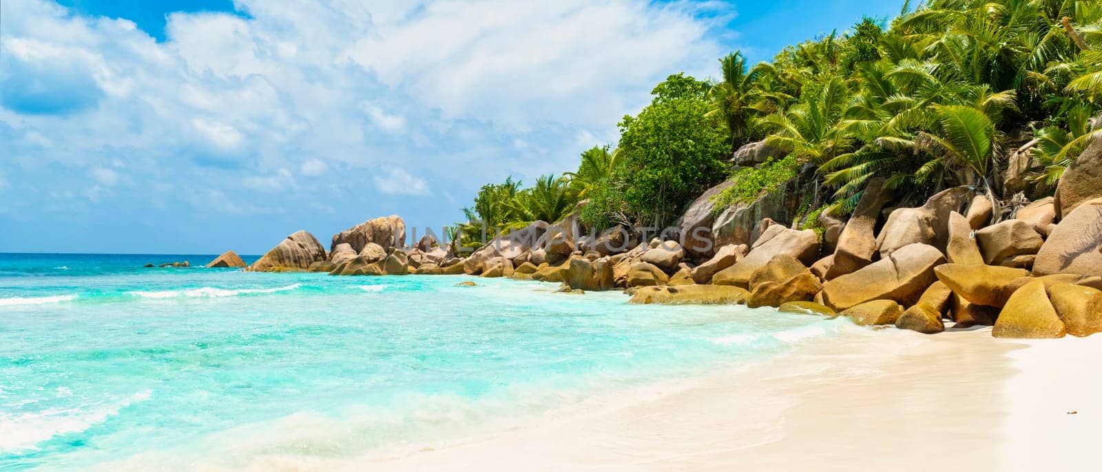 Grand Anse Beach La Digue Seychelles Islands, white tropical beach with turquoise colored ocean by fokkebok