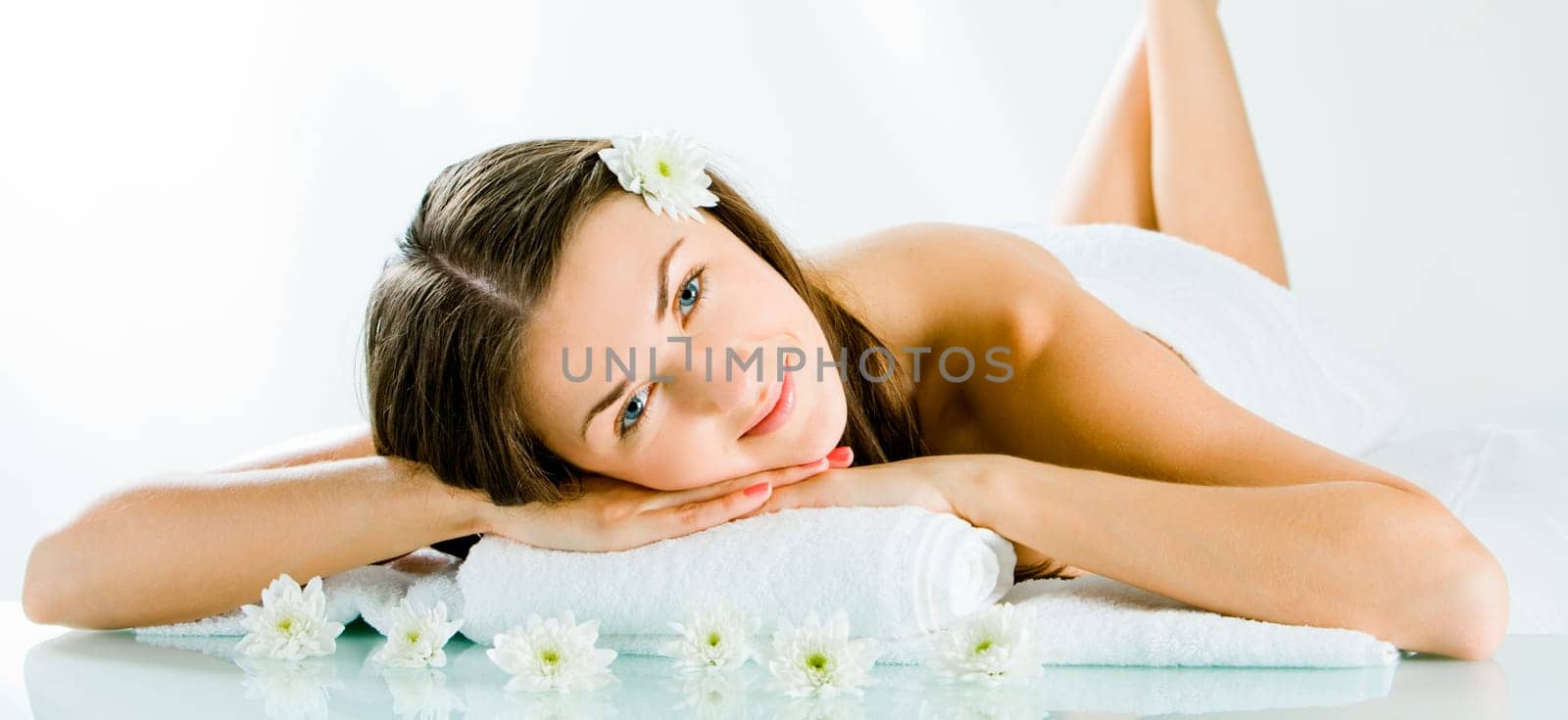 Portrait of cheerful woman resting and looking at camera