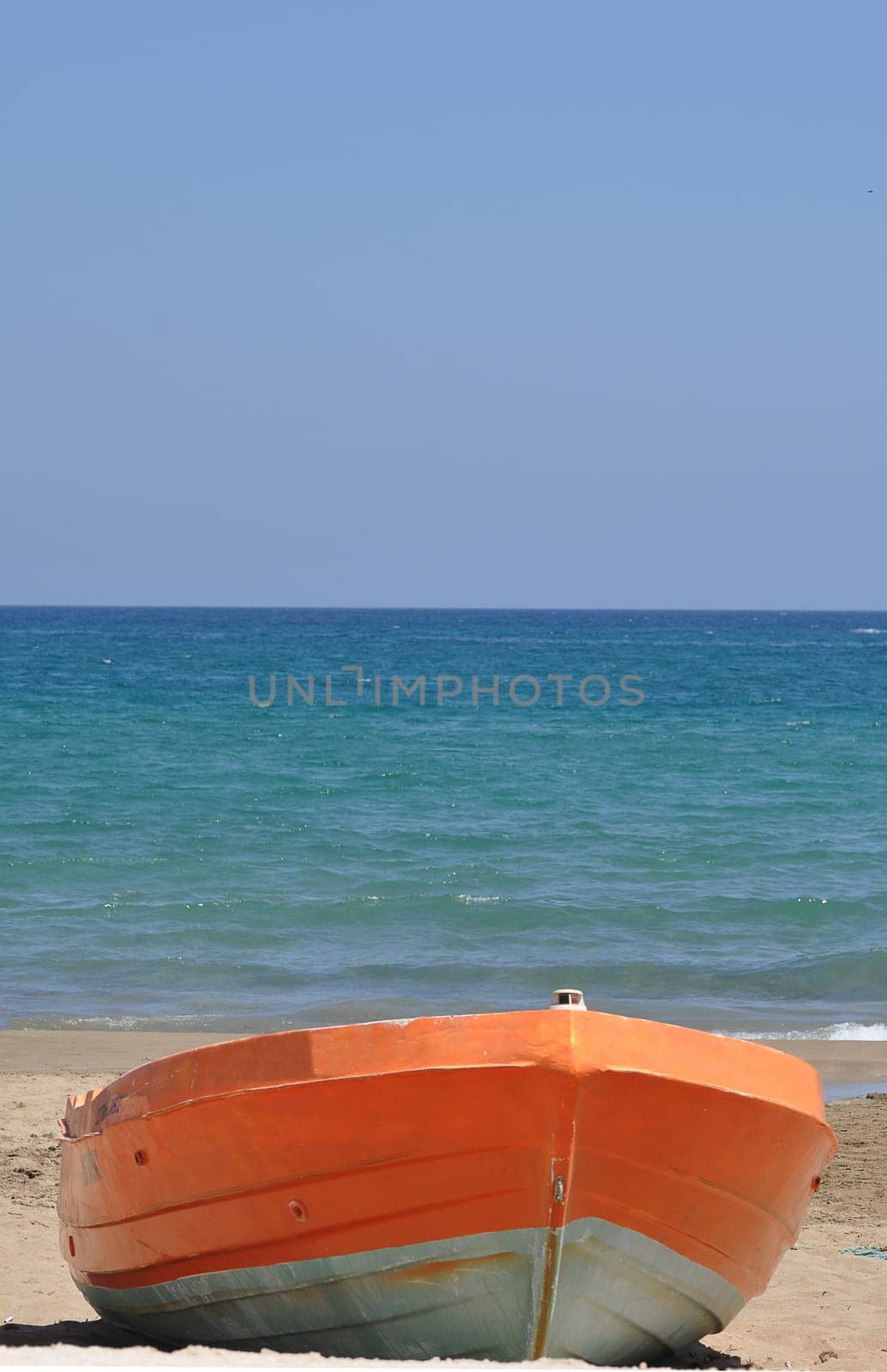 small boat on the beach