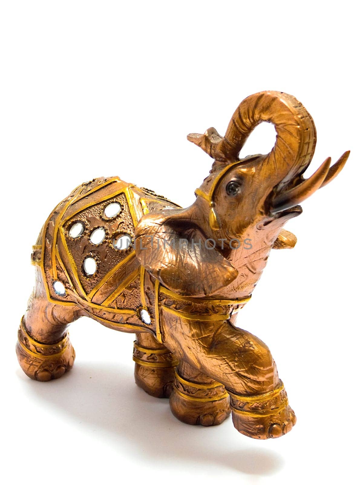 A feng shui gold elephant isolated on white background