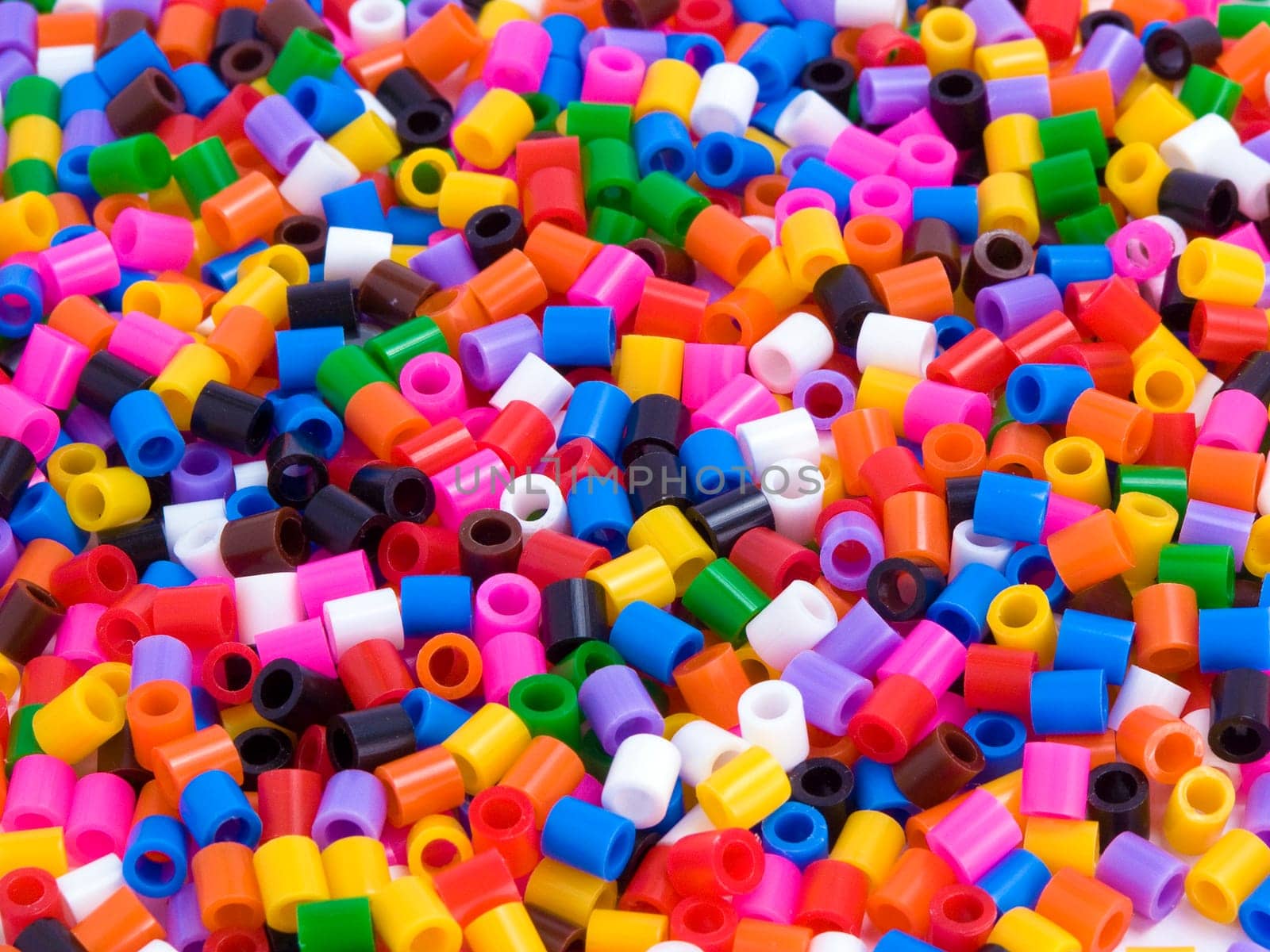 A lot of multicoloured beads, used as Background