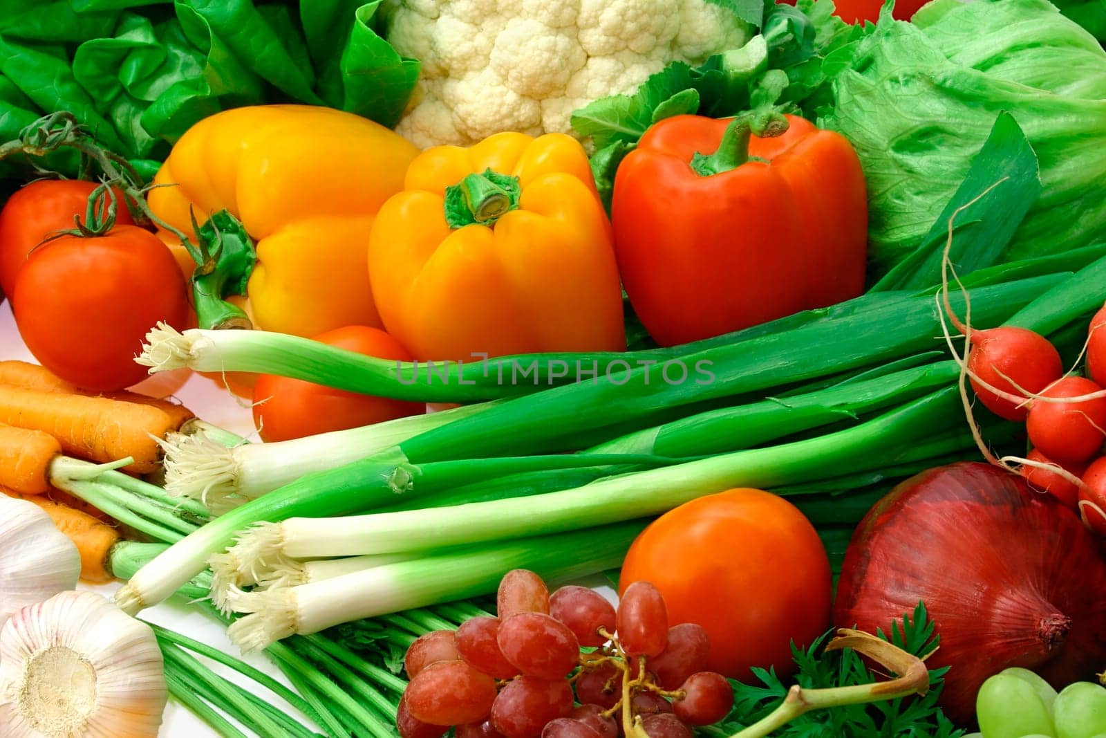Vegetables and fruits are displayed showing their vibrant colors.