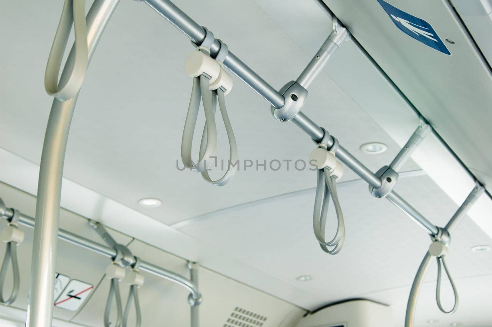Handles for standing passenger inside a bus