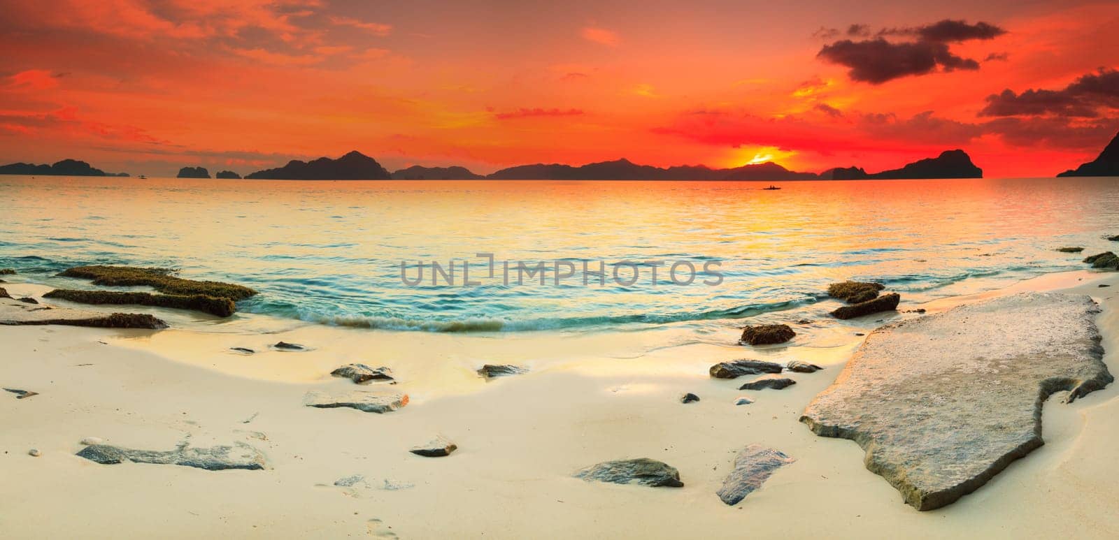 Beautiful seascape panorama. Stone on the foreground. Philippines