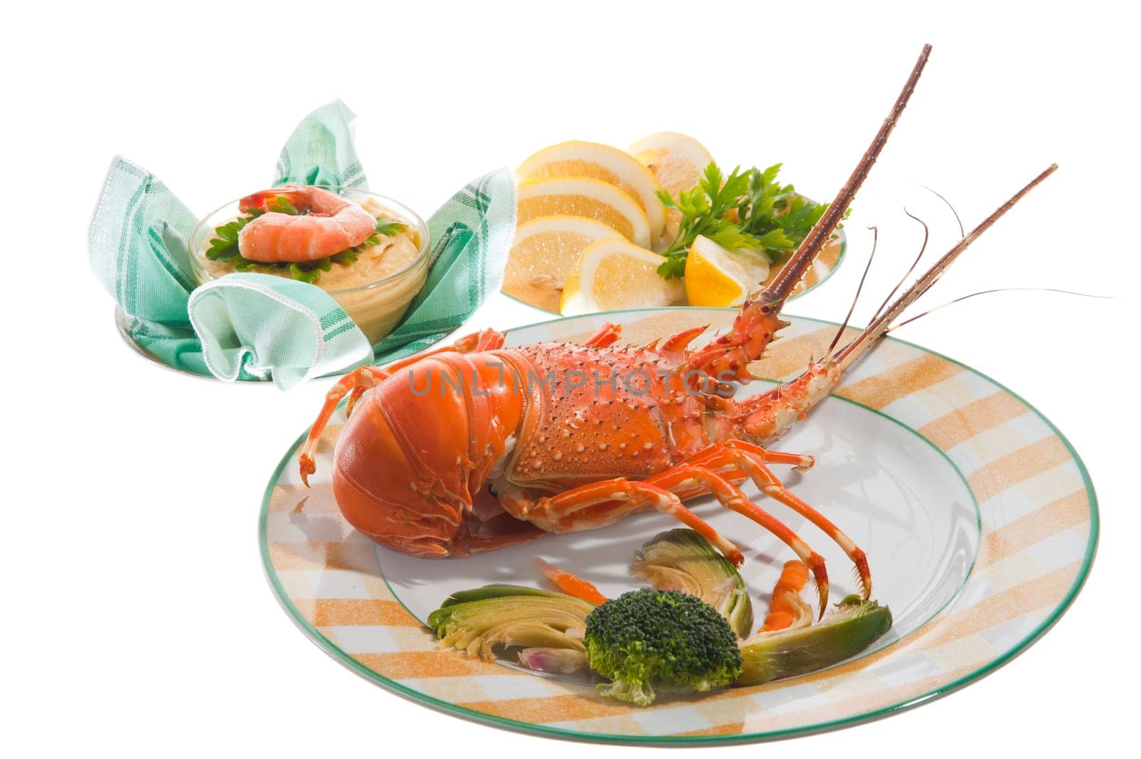 lobsters and crayfish sauce on colored background