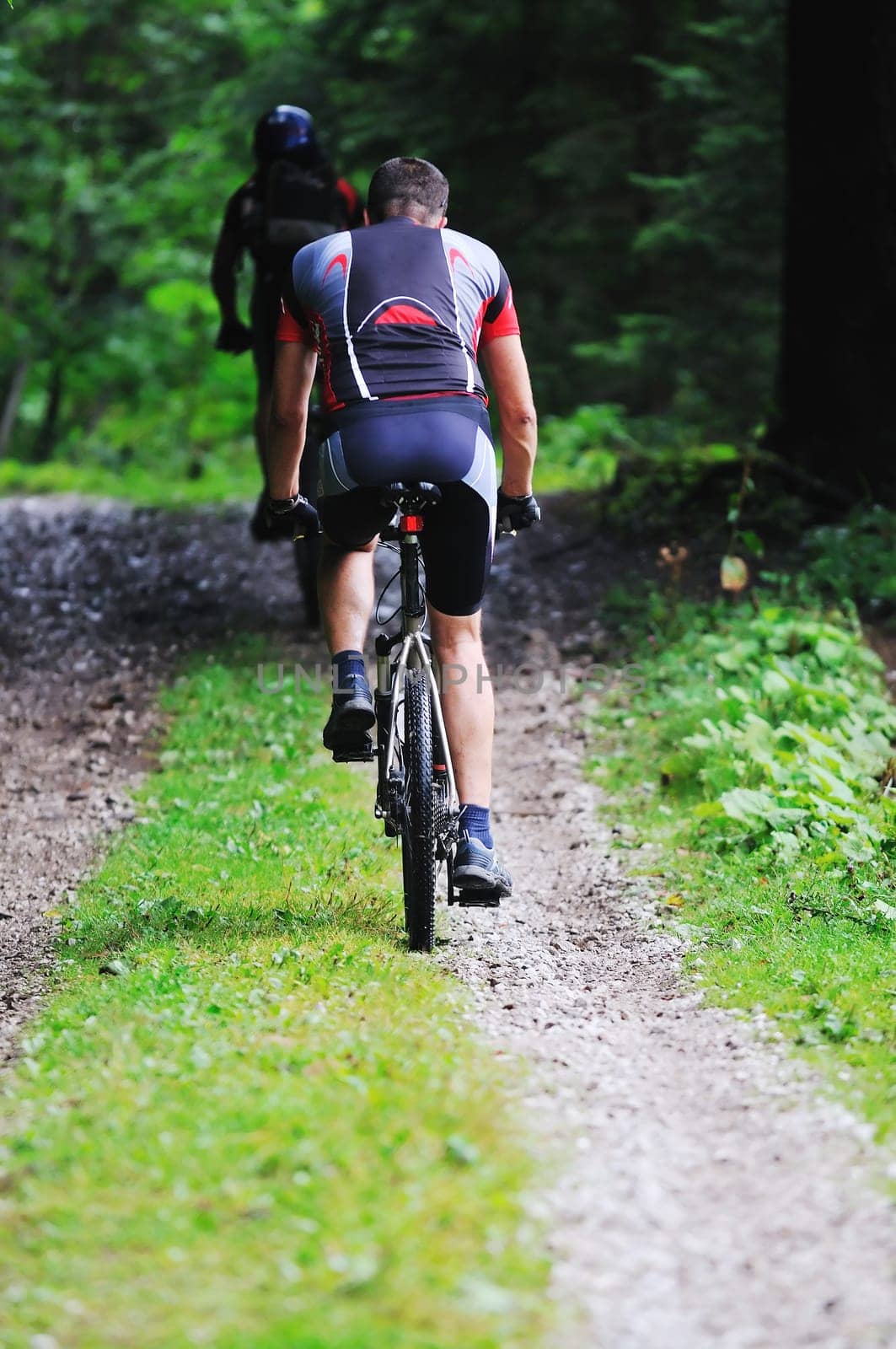healthy lifestyle and fitness concept with mount bike man outdoor