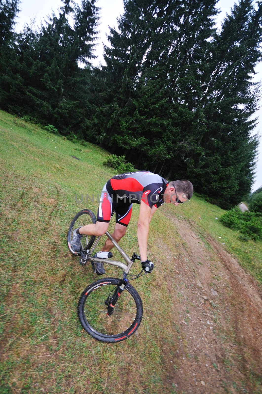 healthy lifestyle and fitness concept with mount bike man outdoor