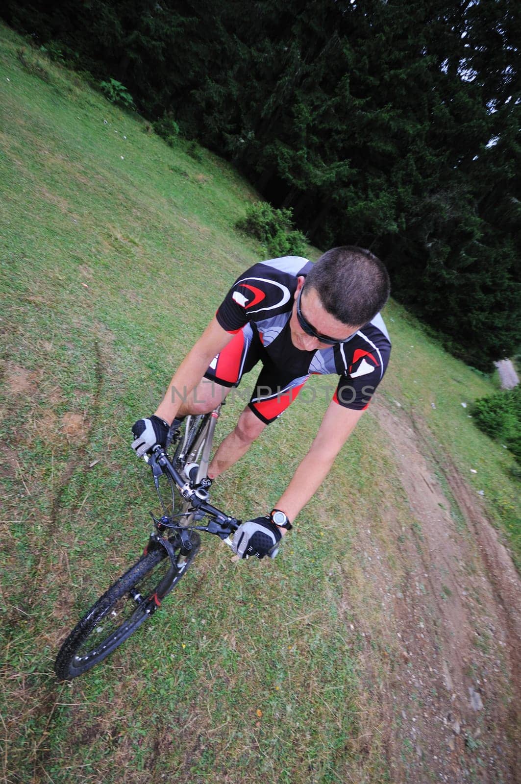 healthy lifestyle and fitness concept with mount bike man outdoor