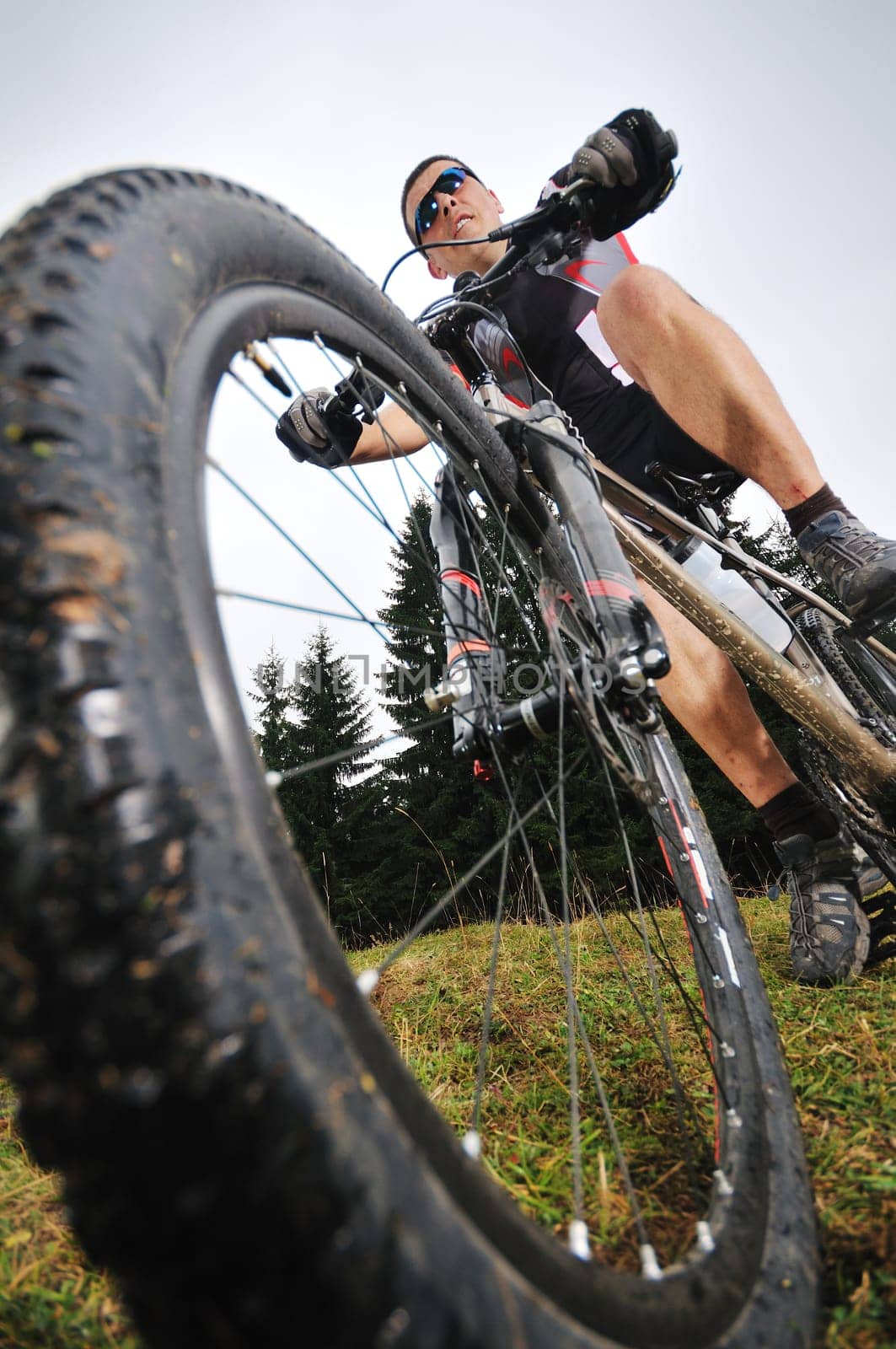 healthy lifestyle and fitness concept with mount bike man outdoor
