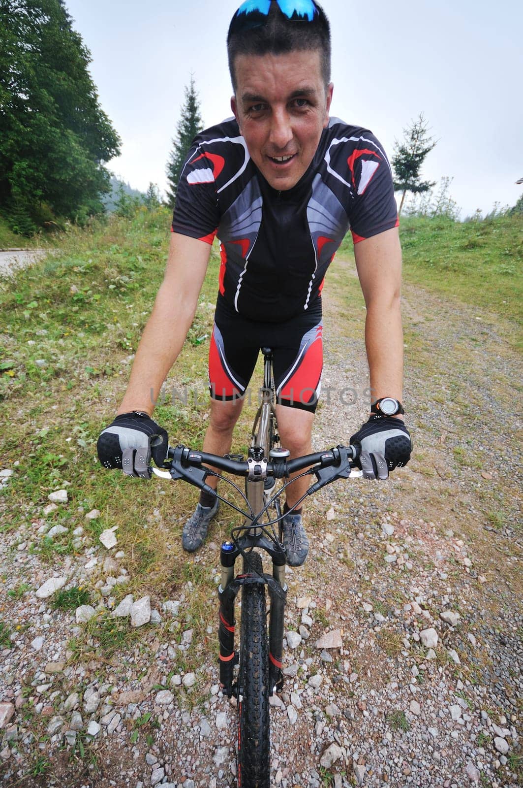 healthy lifestyle and fitness concept with mount bike man outdoor
