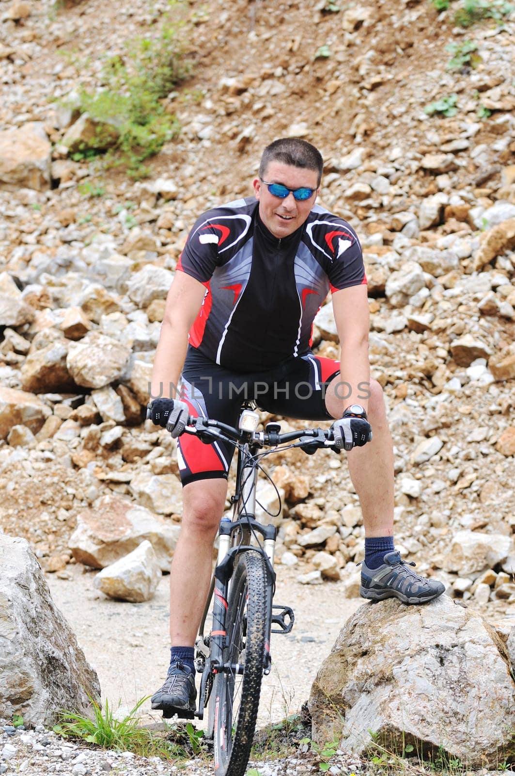 healthy lifestyle and fitness concept with mount bike man outdoor