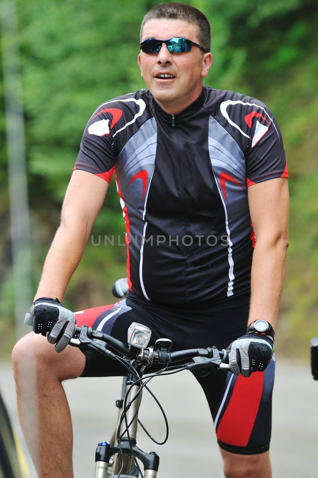 healthy lifestyle and fitness concept with mount bike man outdoor