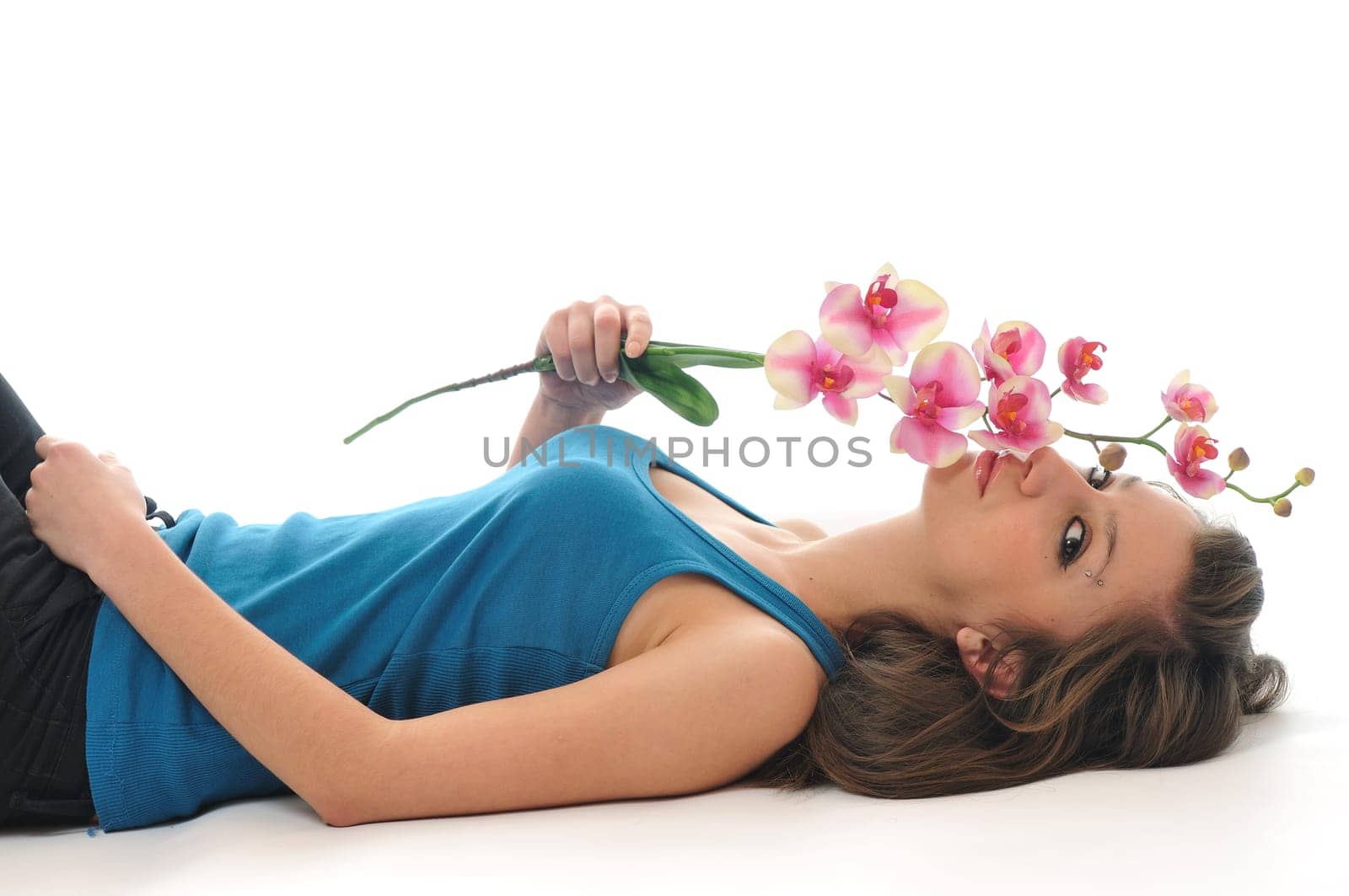 beauty halth and spa wellness isolated young woman face portrait closeup with towel and flower treatment