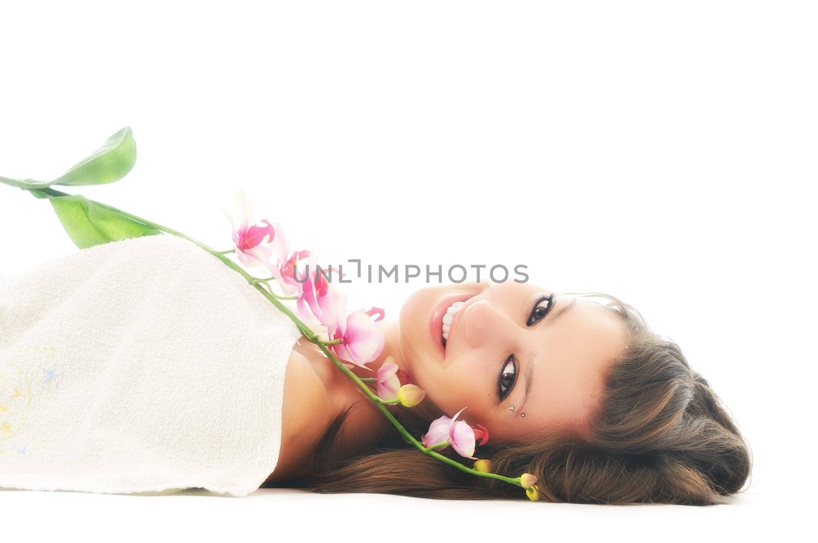 beauty halth and spa wellness isolated young woman face portrait closeup with towel and flower treatment