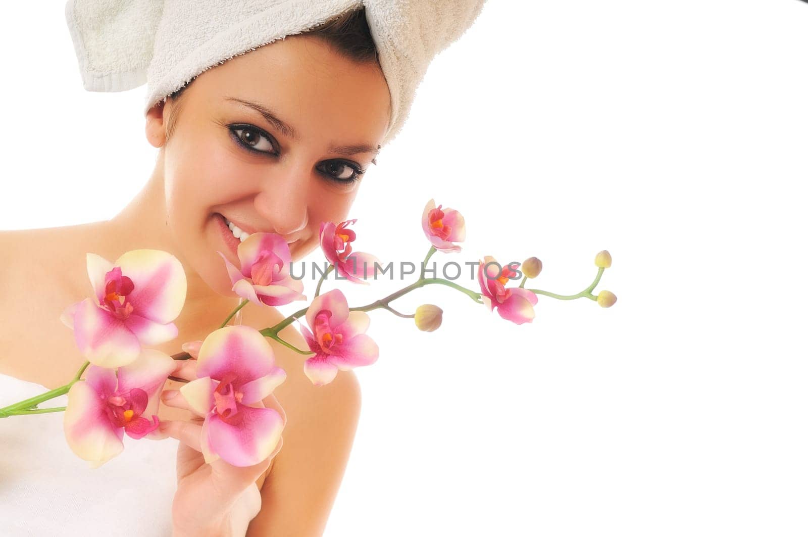 beauty halth and spa wellness isolated young woman face portrait closeup with towel and flower treatment