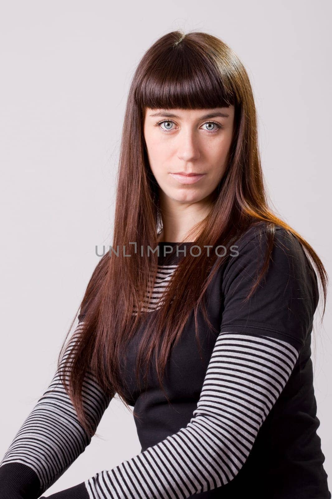 portrait of a young woman posing during a photo session