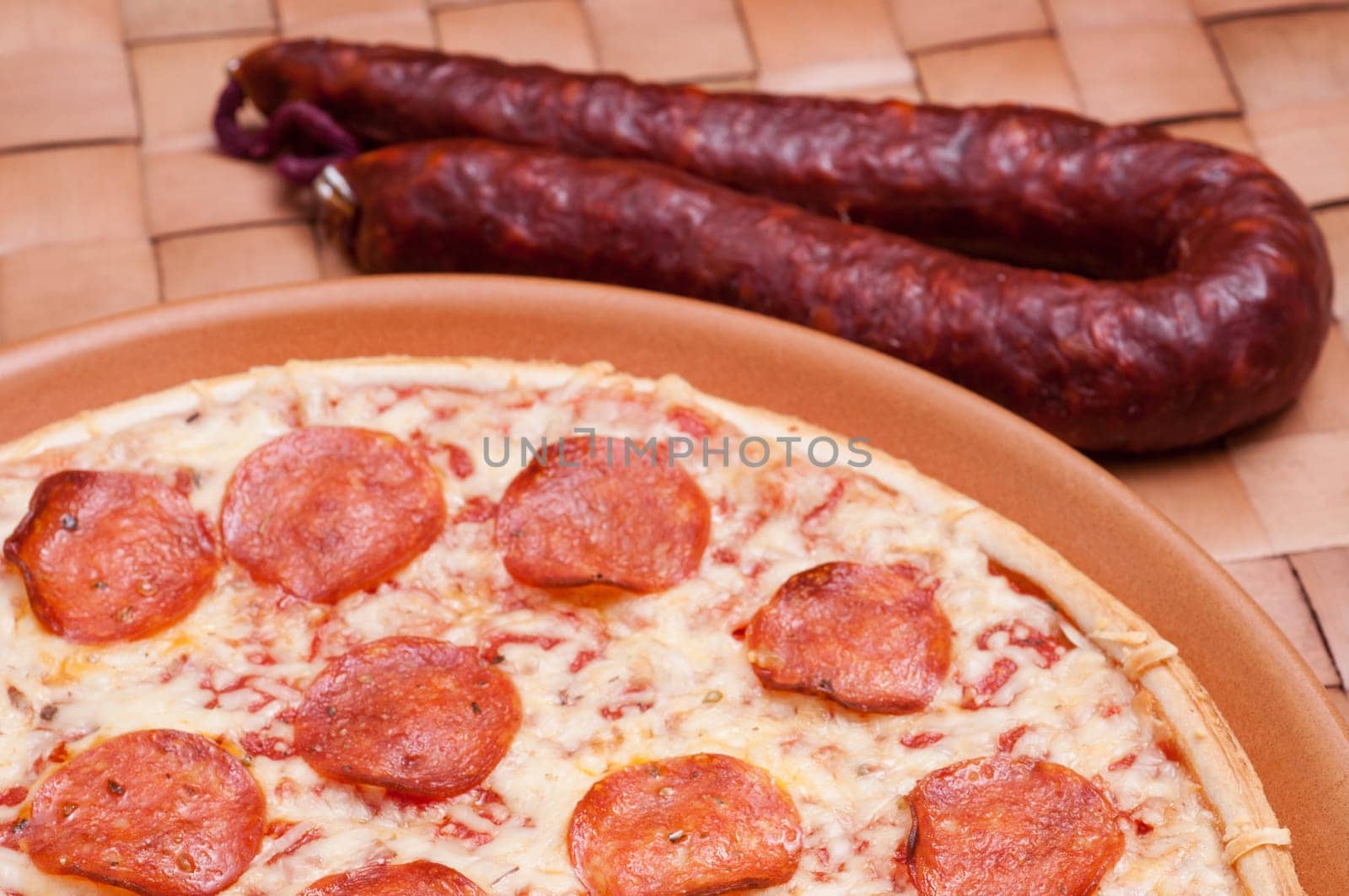 Pizza with salami,cheese and tomatoes