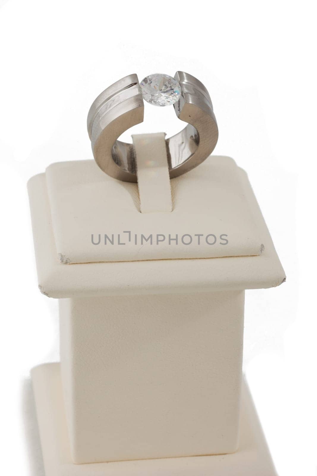 Studio shot of diamond ring on display stand