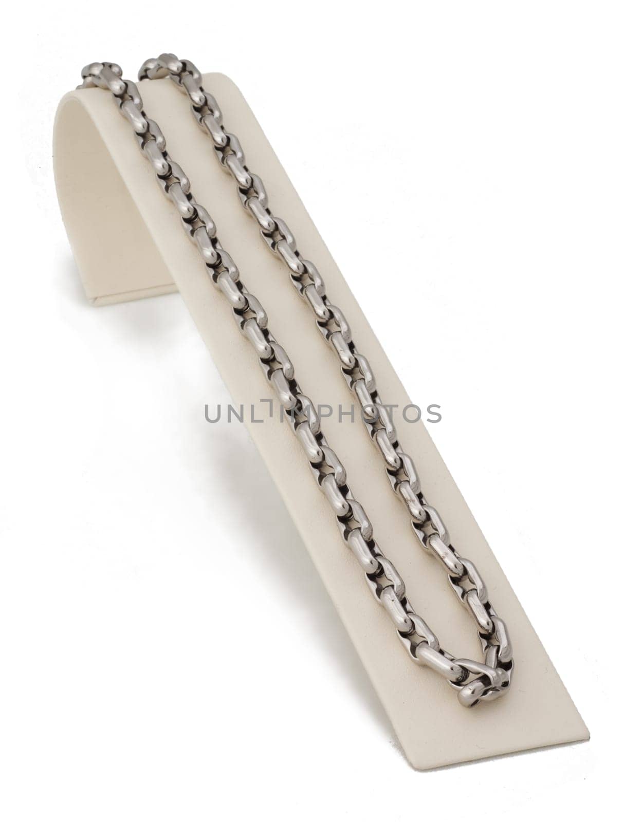 Silver linked chain necklace on display stand