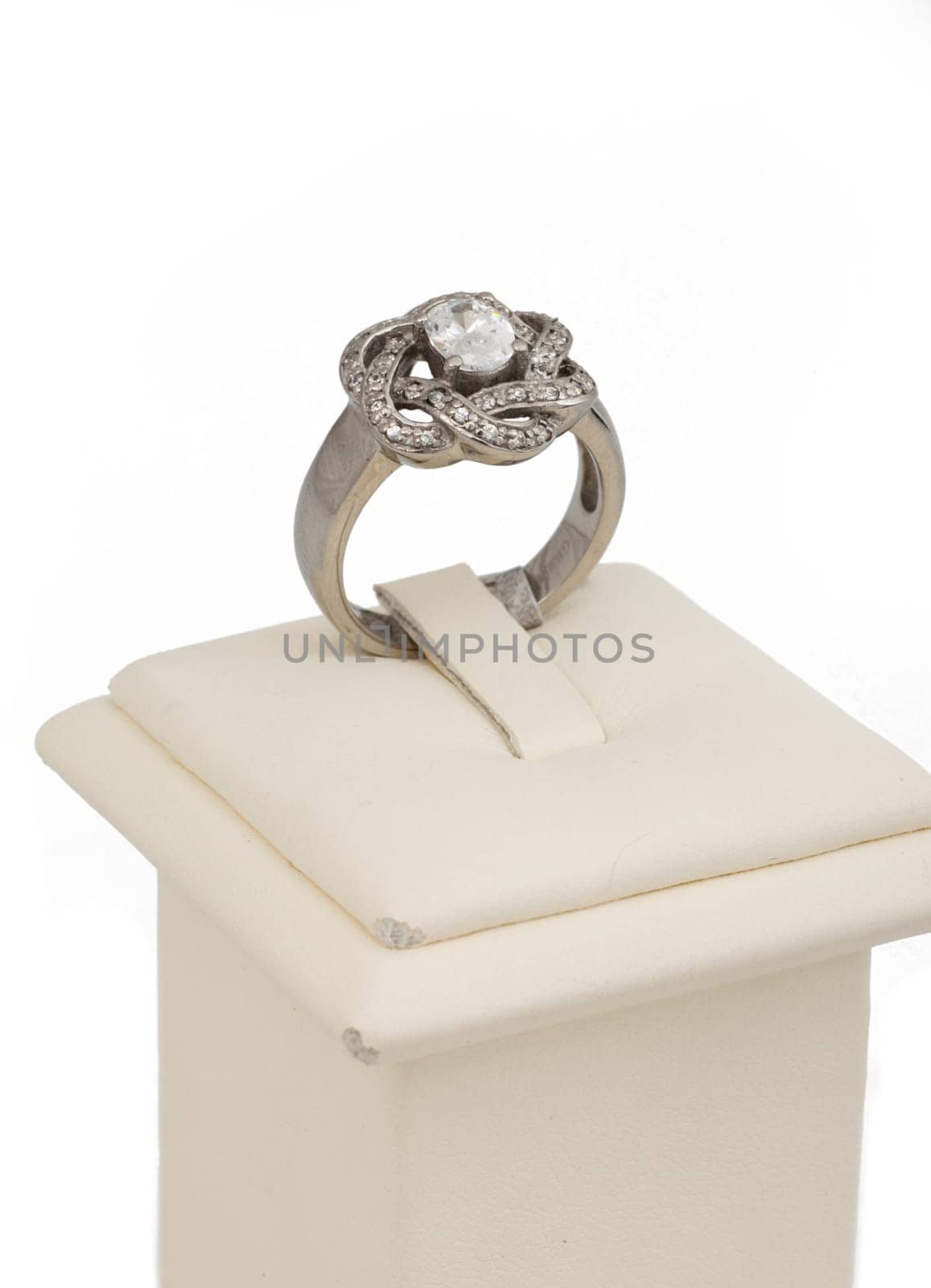 Studio shot of diamond ring on display stand