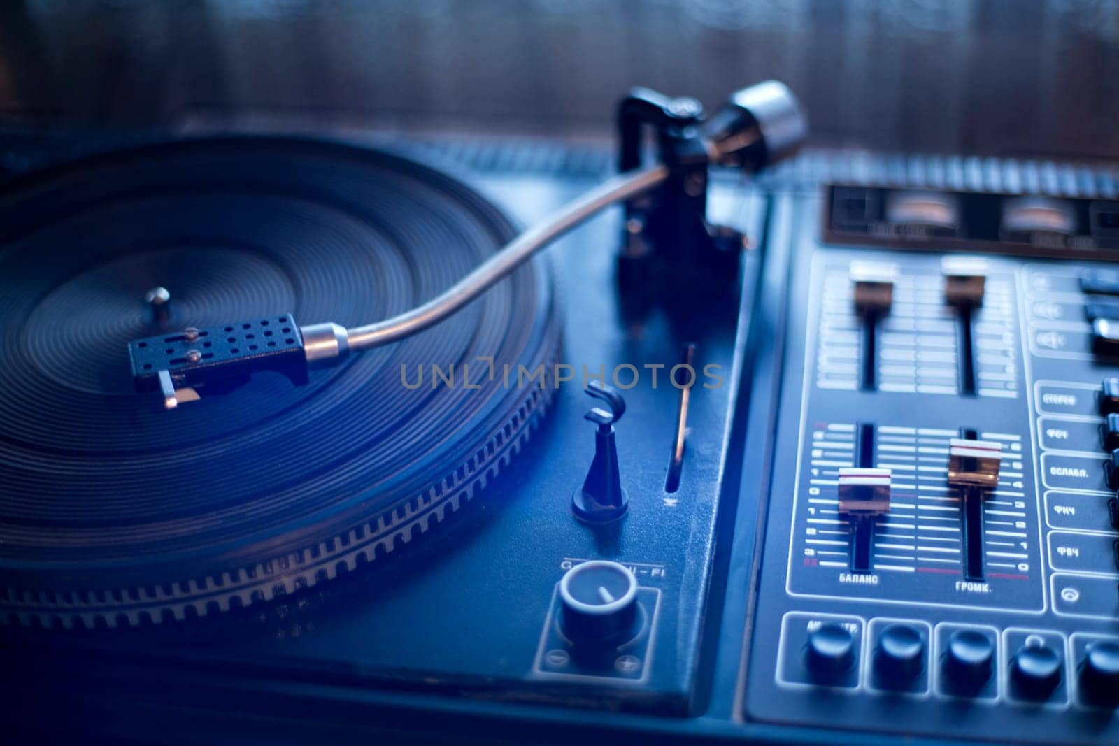 Outfashioned vinyl player is waiting its wise user