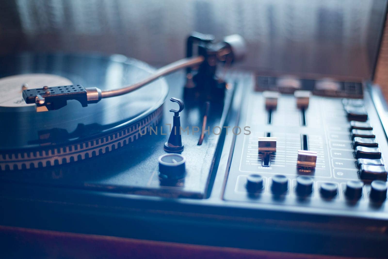 Old vinyl player controllers and ready placed vinyl