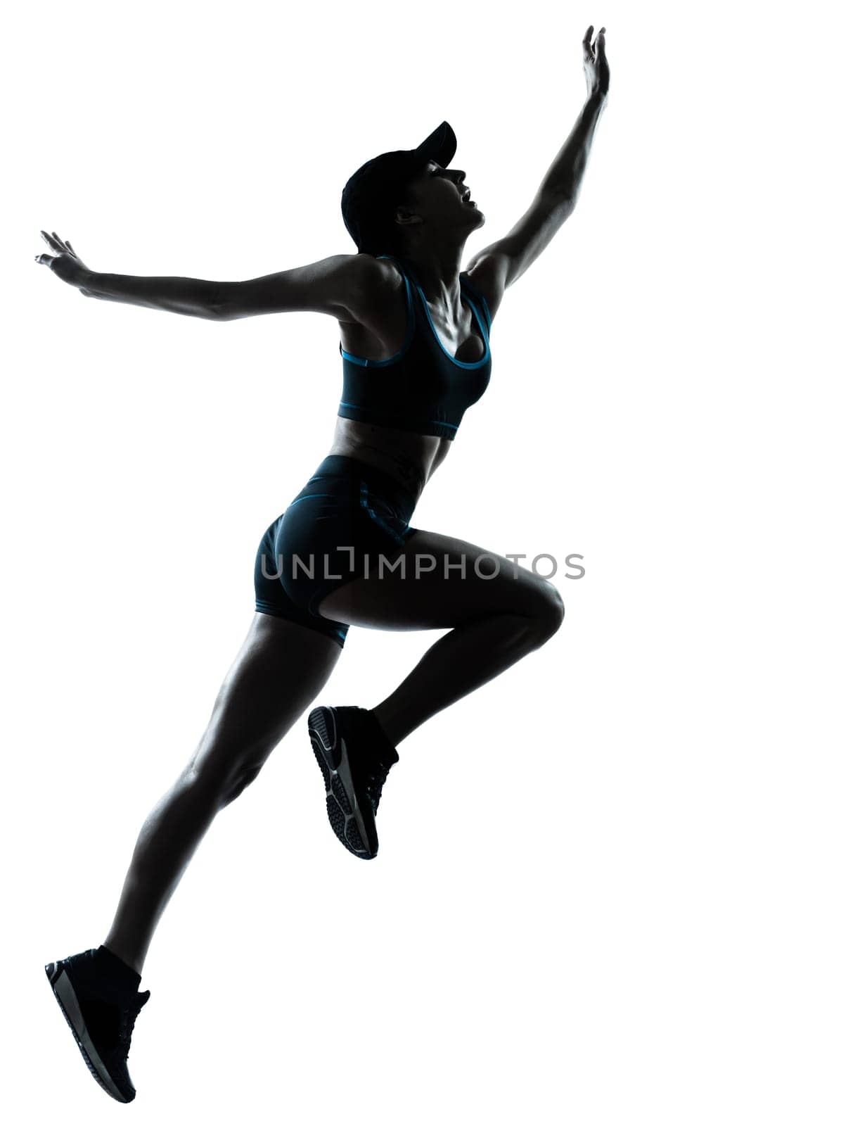 one caucasian woman runner jogger jumping in silhouette studio isolated on white background