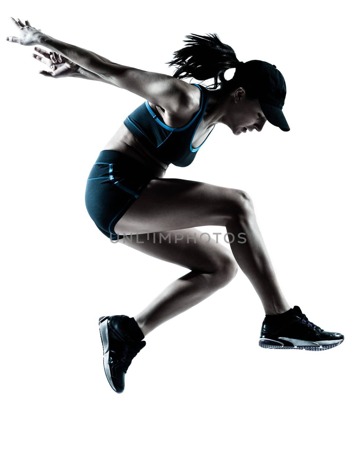 one caucasian woman runner jogger jumping in silhouette studio isolated on white background