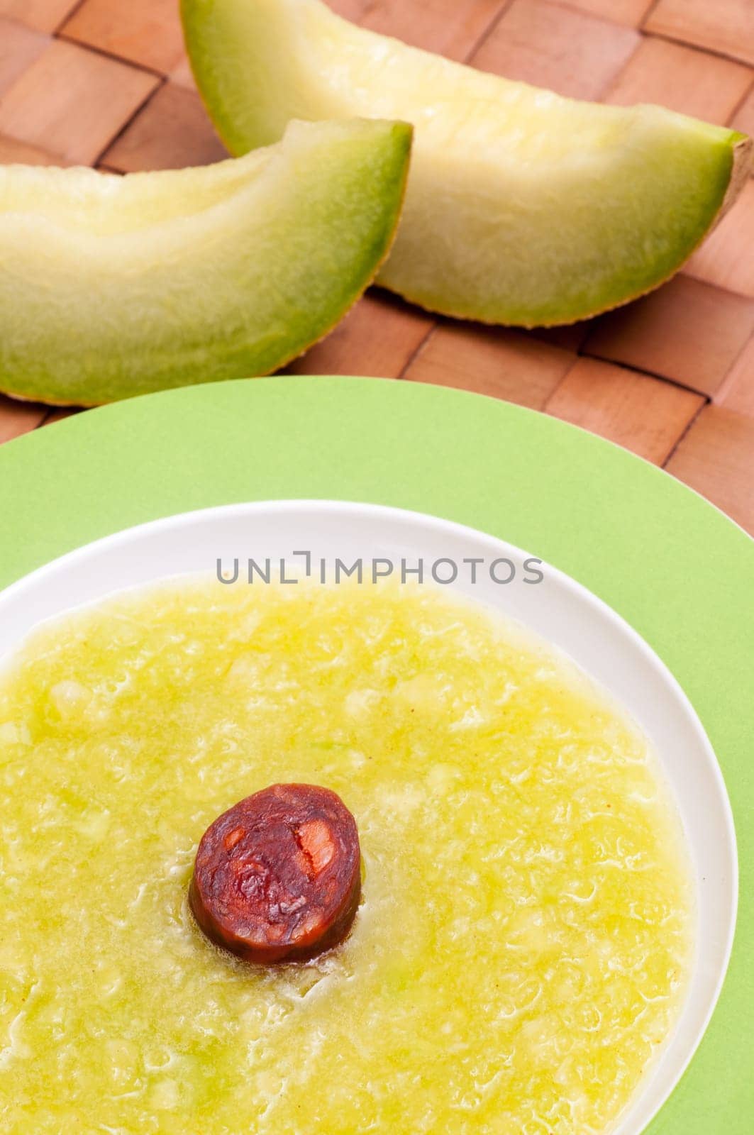 Cold soup with melon and Spanish chorizo sausage