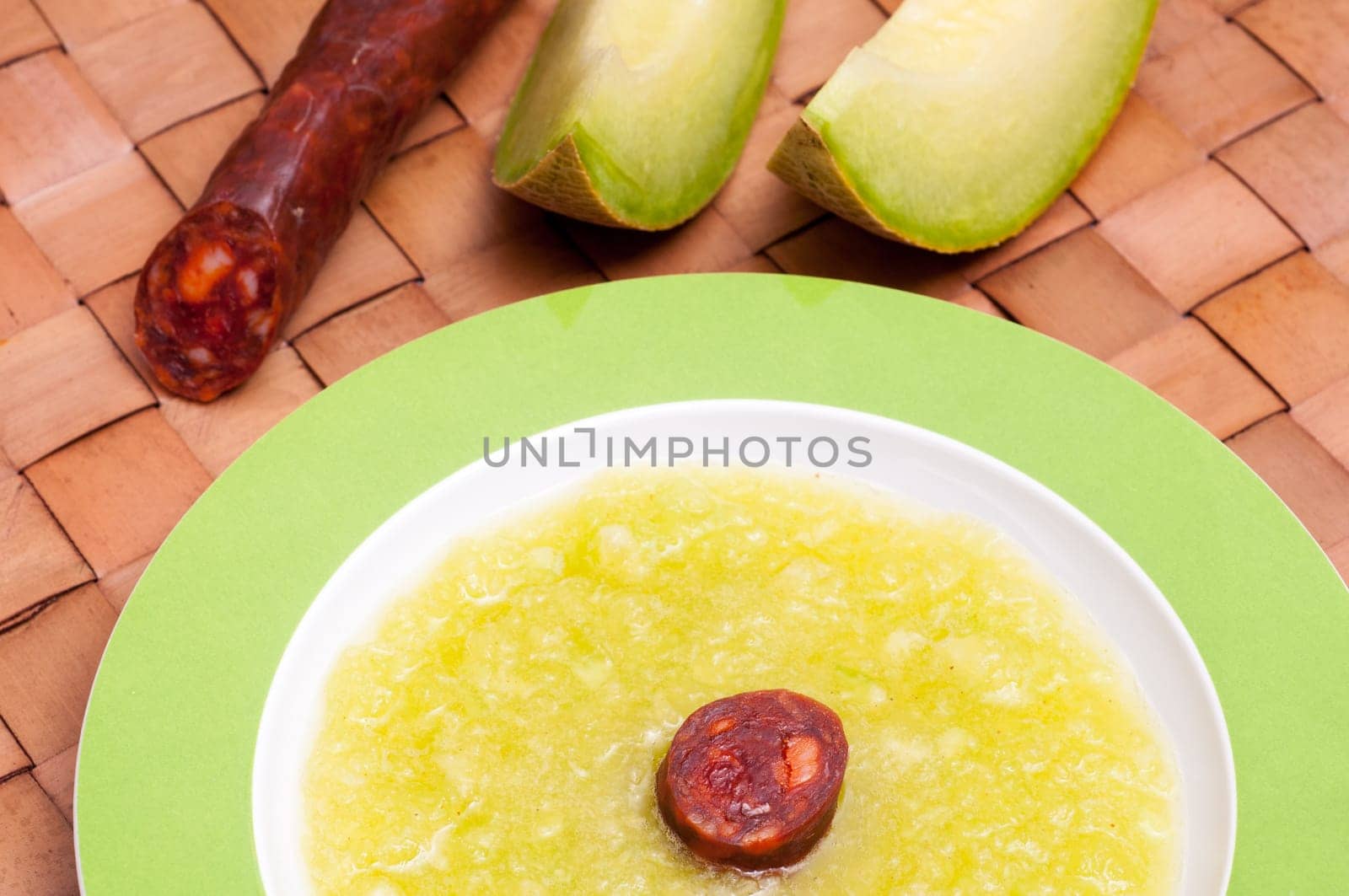 Cold soup with melon and chorizo sausage
