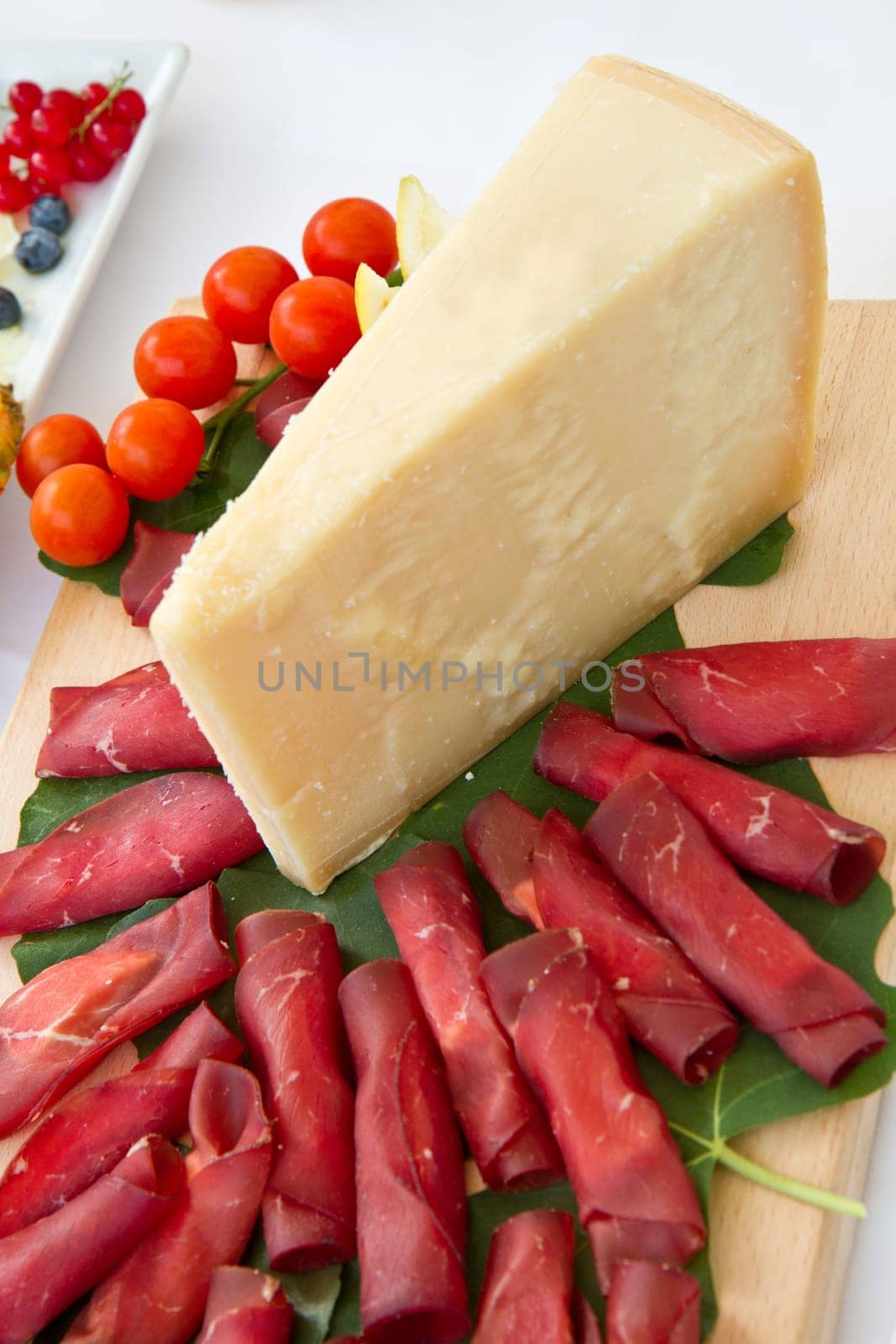 Italian appetizer with bresaola and parmesan cheese