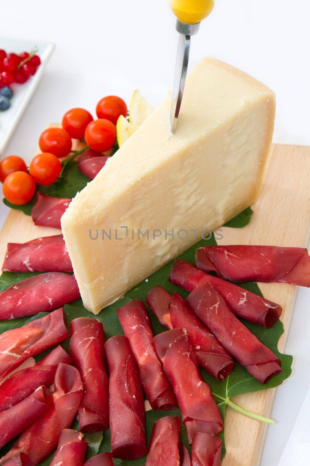 Italian appetizer with bresaola and parmesan cheese