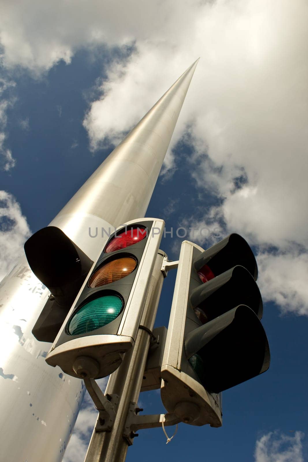 Traffic light in front of Dublin Spire in Dublin,Ireland,designed by Ian Ritchie Architects