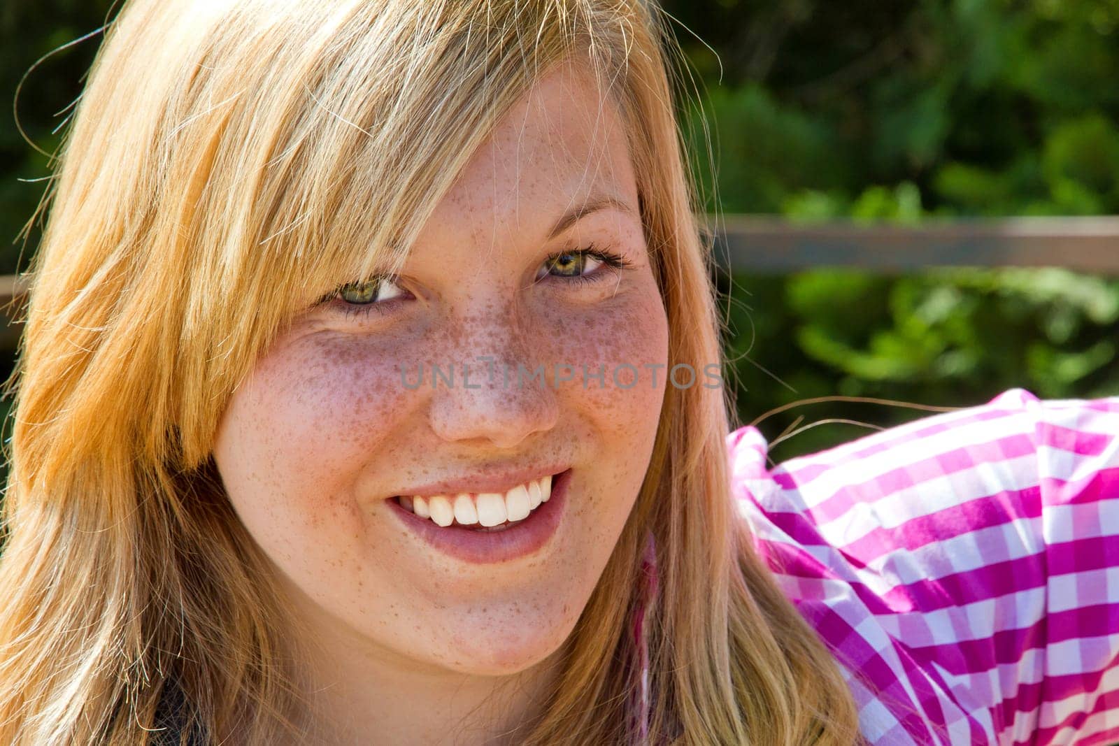 Portrait of a teenager with freckles