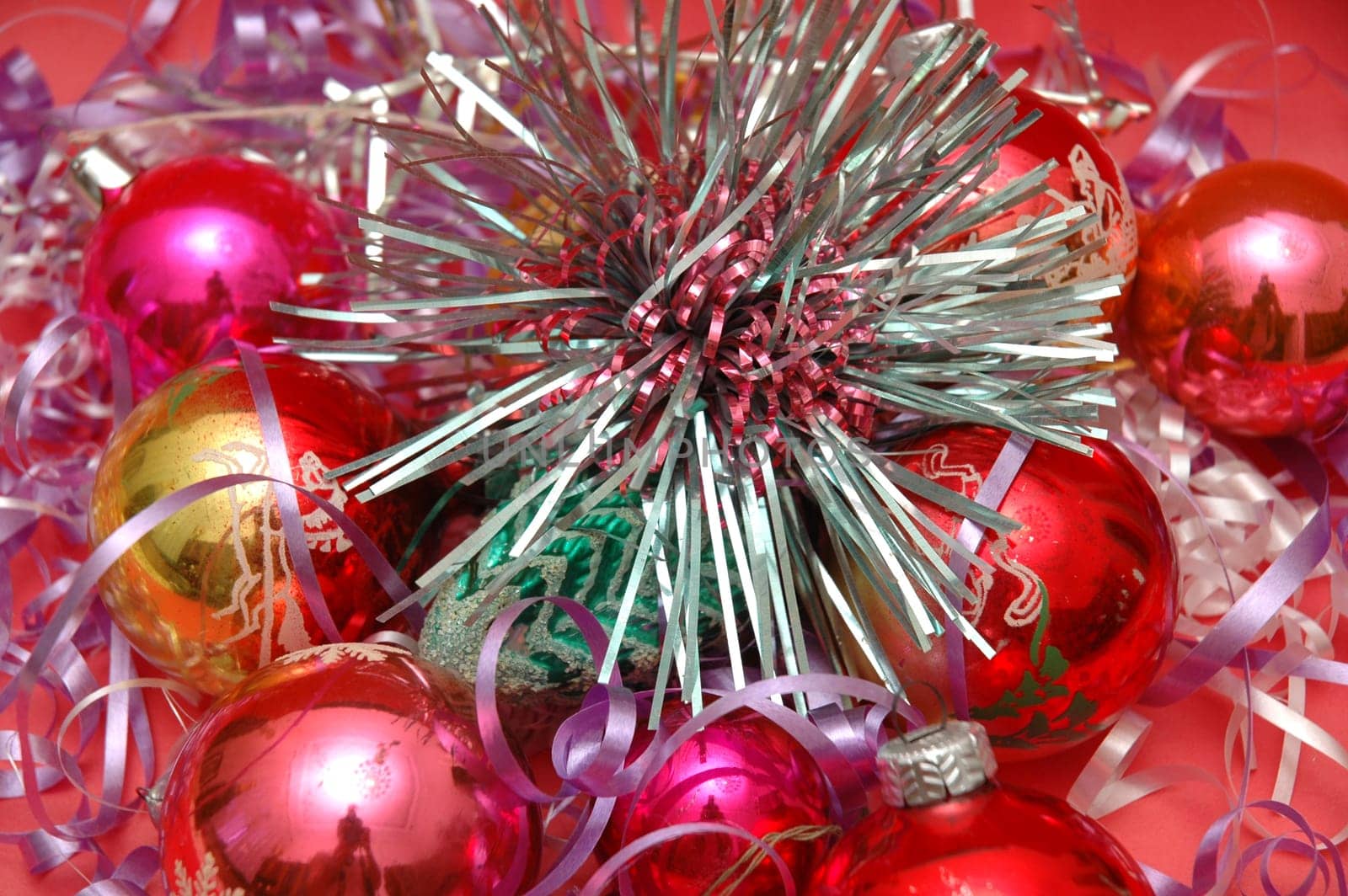 Various Christmas decorations on red background