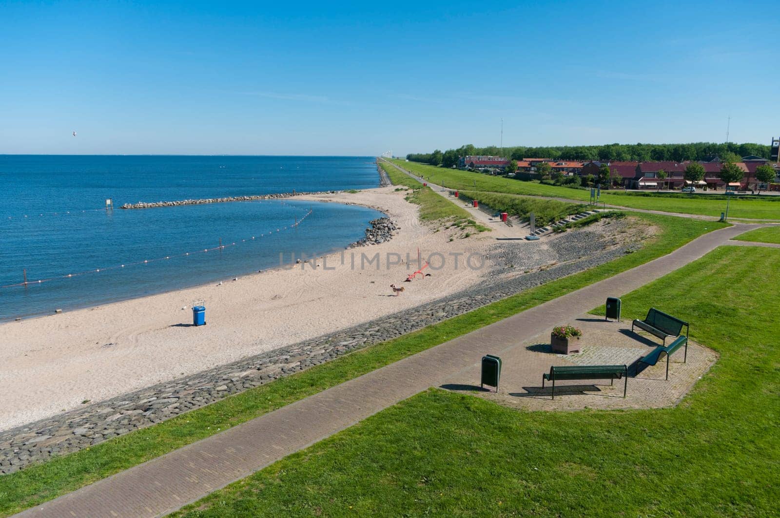 view over a small beach along the IJsselmeer in the Netherlands