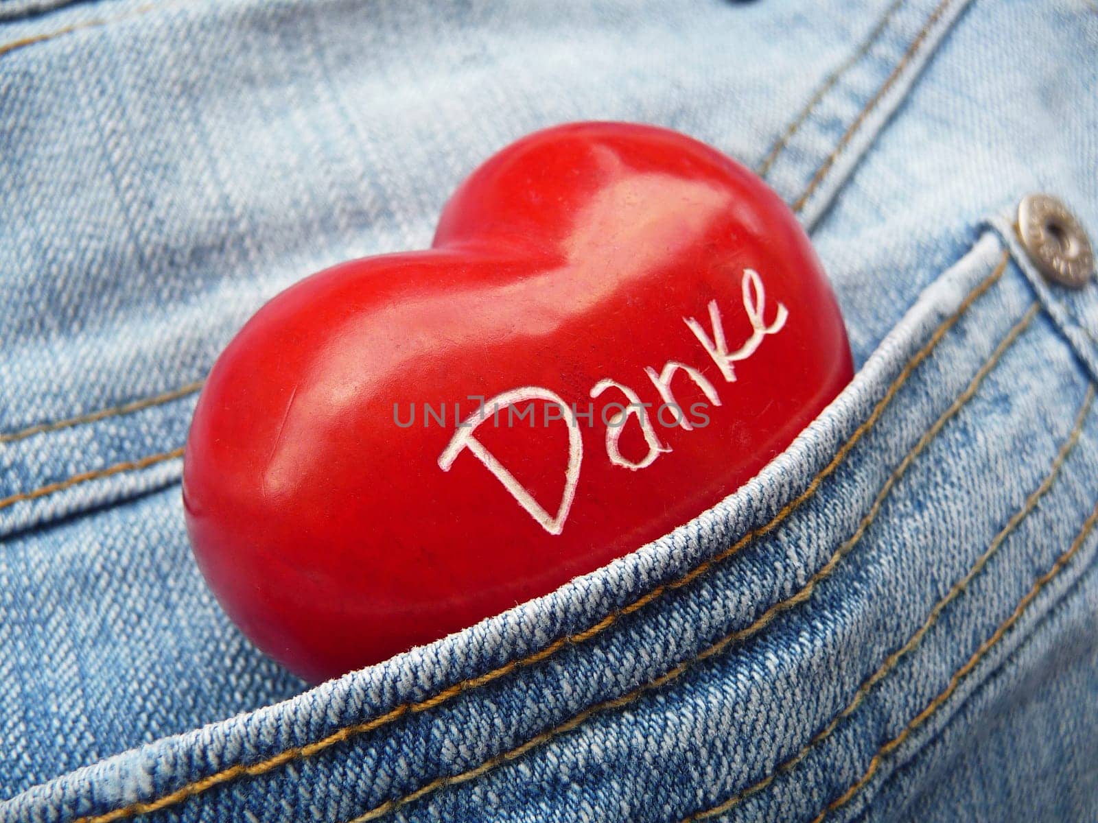 Thank you in jeans pocket