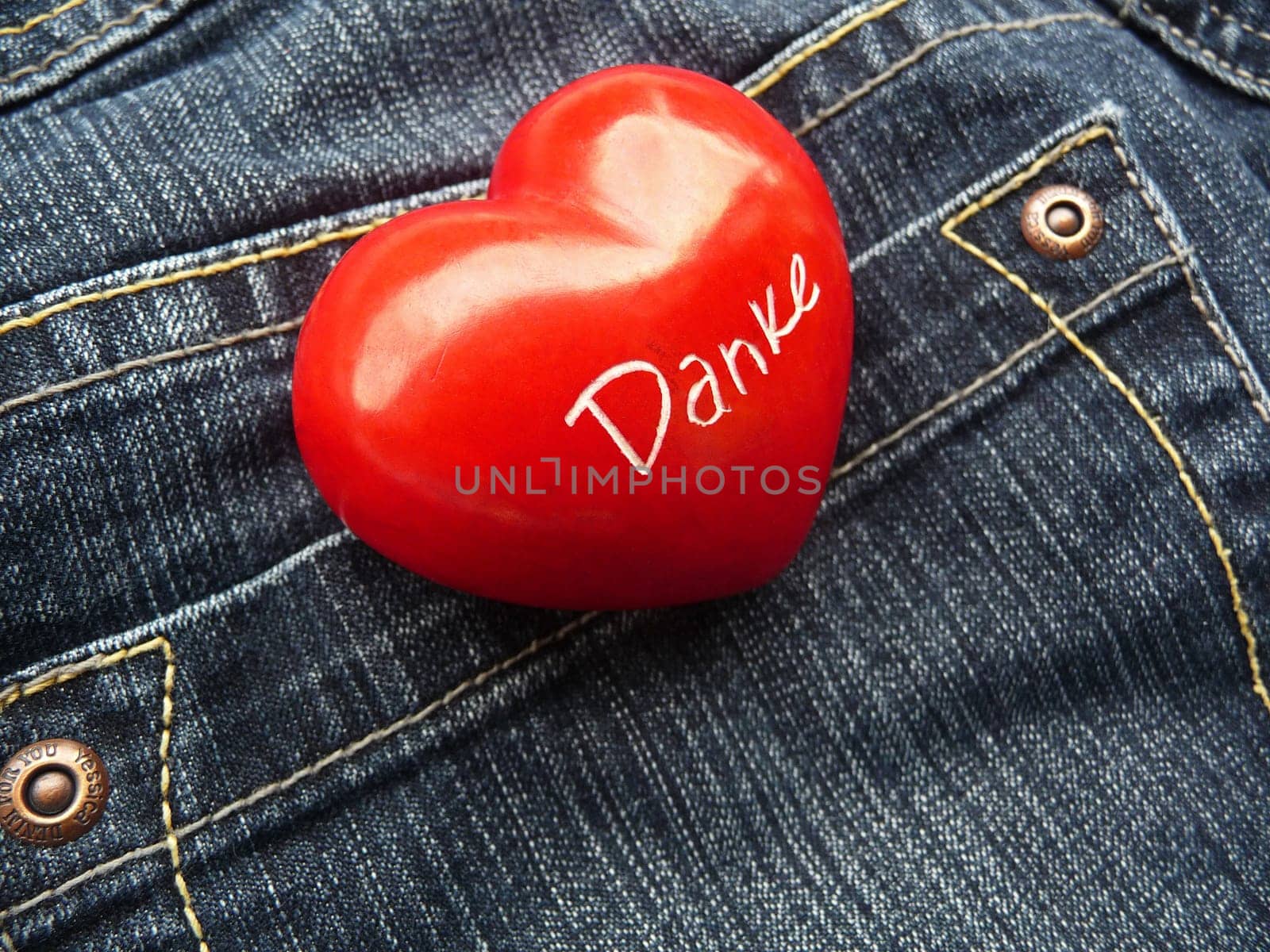 Thank you in jeans pocket