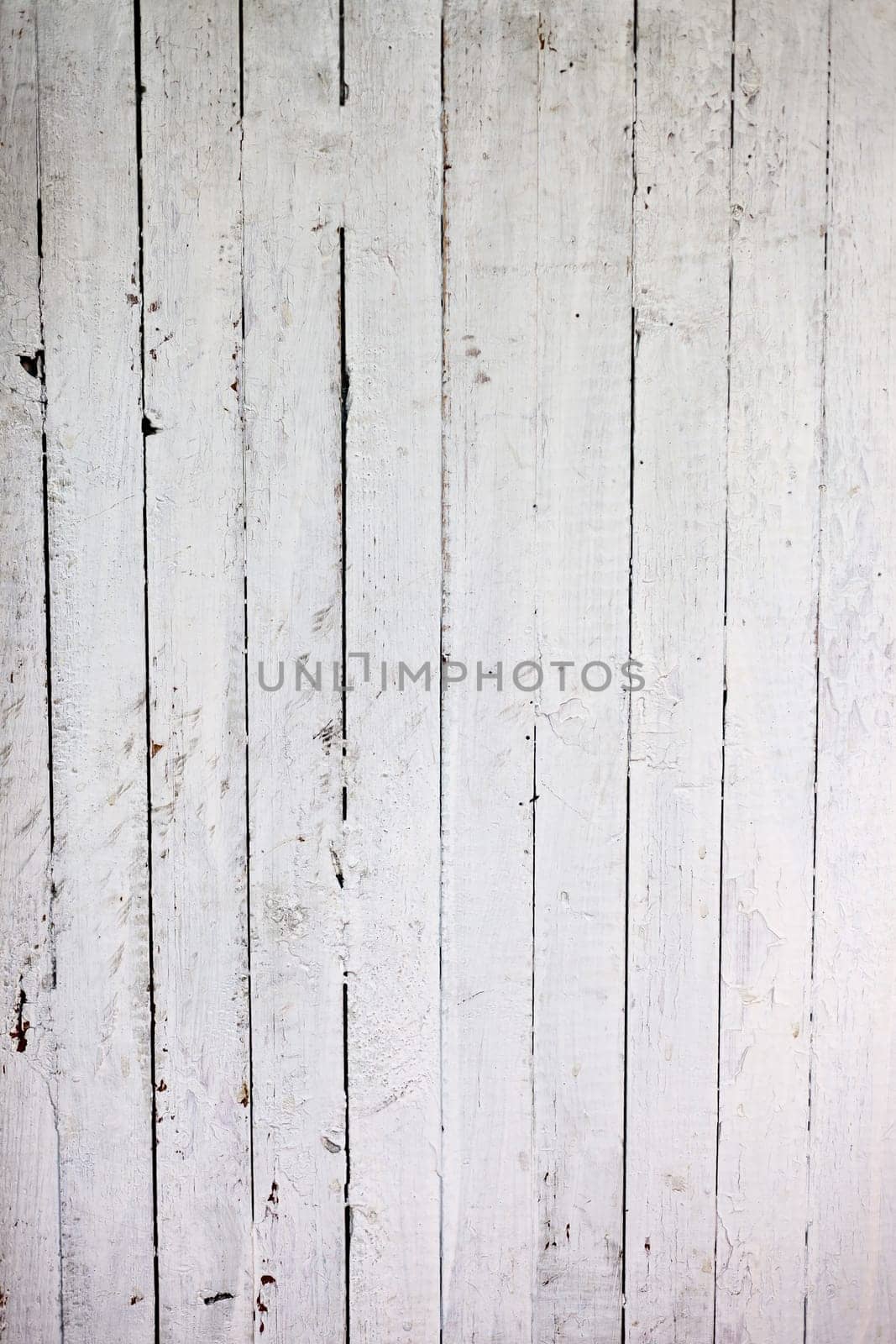 the background of weathered white painted wood