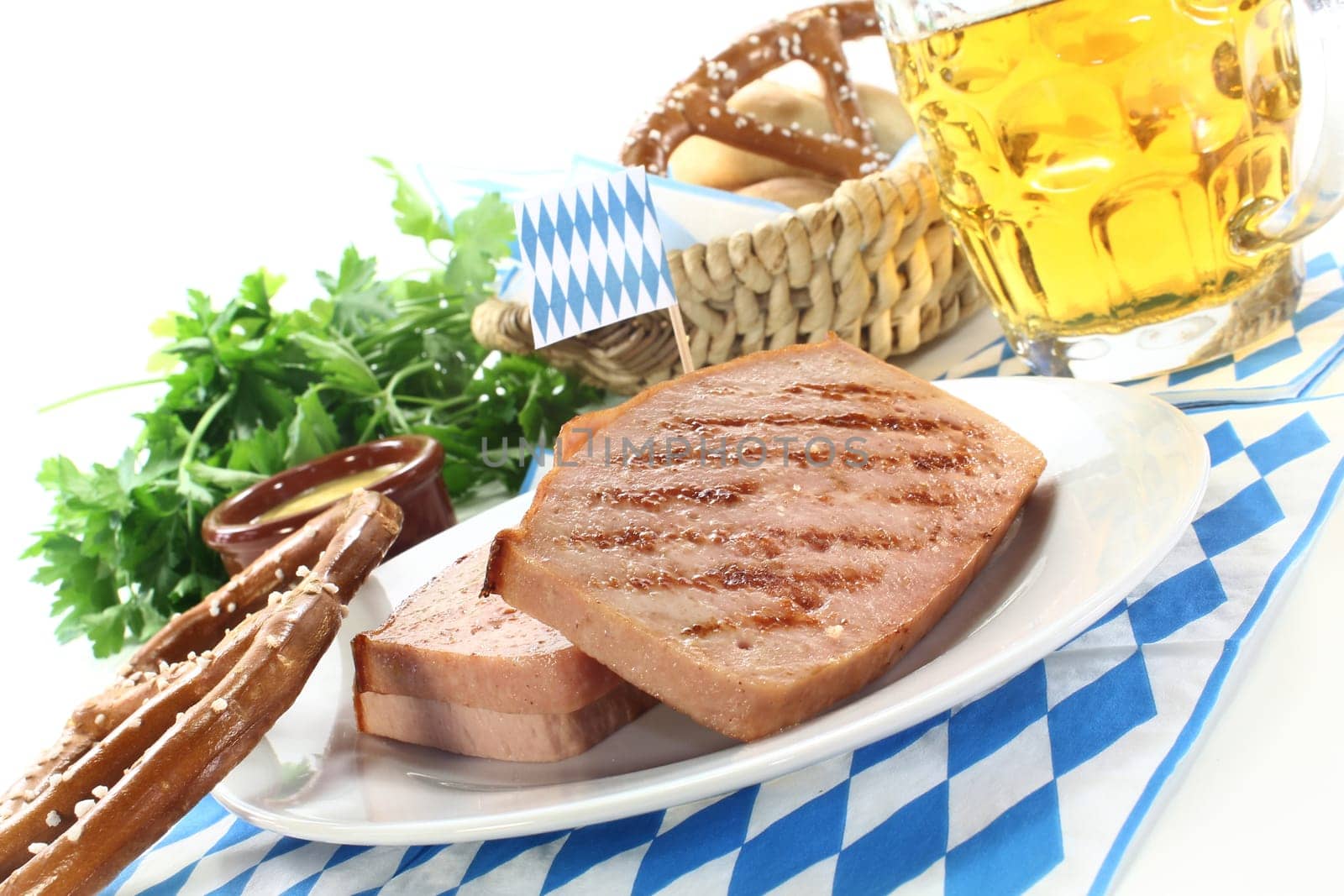 a pretzel with meatloaf and parsley