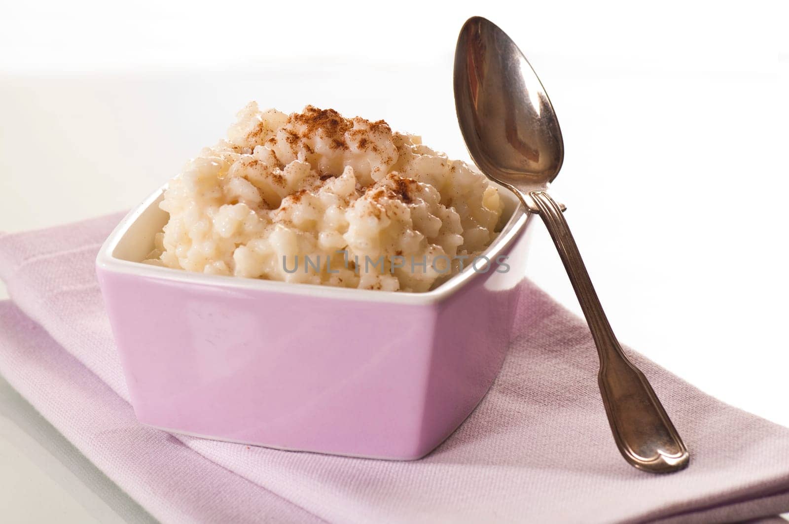 Rice pudding in pink bowls