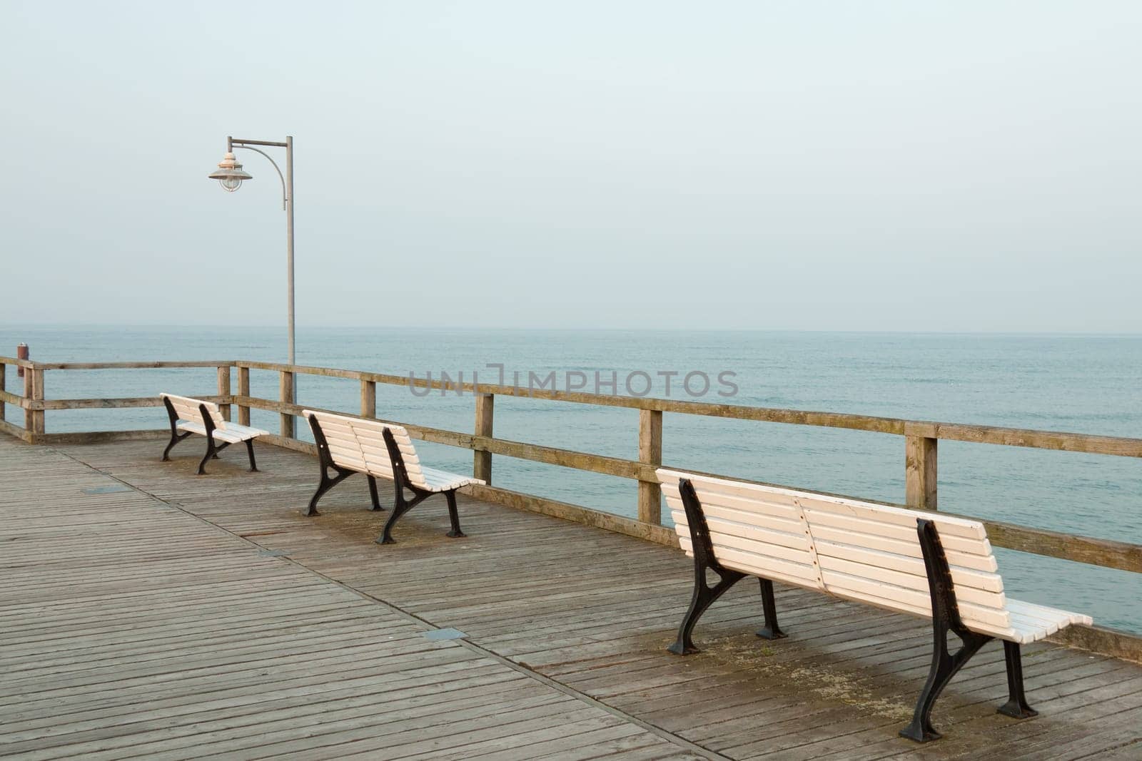 Three benches on the pier of Göhren