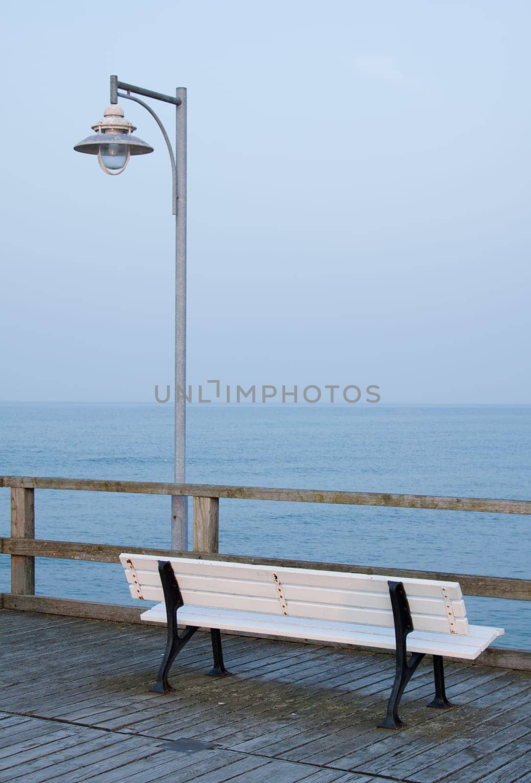 Lantern and bench on the pier of Göhren