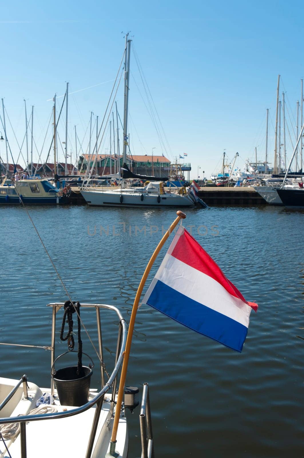 dutch flag on a sailboat in the harbor of Urk, Netherlands