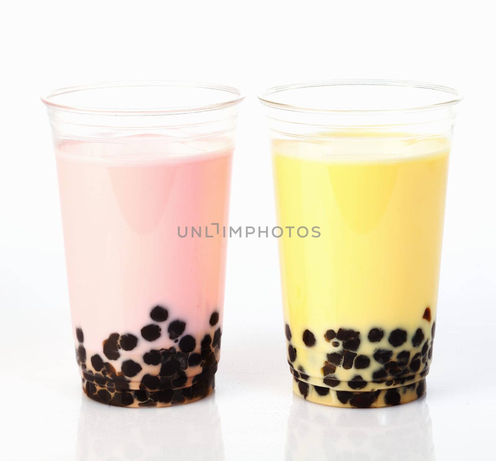Two Glasses delicious Bubble Tea isolated on white background